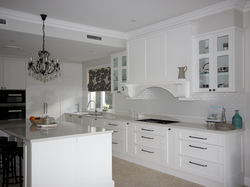 Highland Kitchens - White cabinetry for kitchen and drinks cabinet