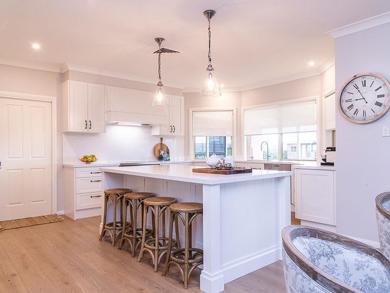 Highland Kitchens - This Provincial style kitchen works beautifully with wood