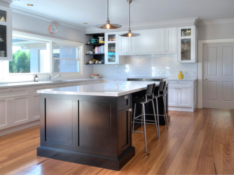 Highland Kitchens - Traditional style kitchen cabinetry bathed in light